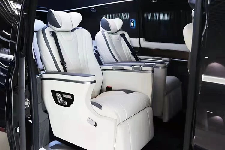 Folding table top can be completely stowed and hidden in the armrest
